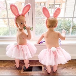 Two sets of bunny ears and tutu skirts